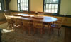 70" oval table with 2 leaves seats 10 comfortably.