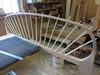 The bow is drillled for spindles which are inserted and cut to rough length.