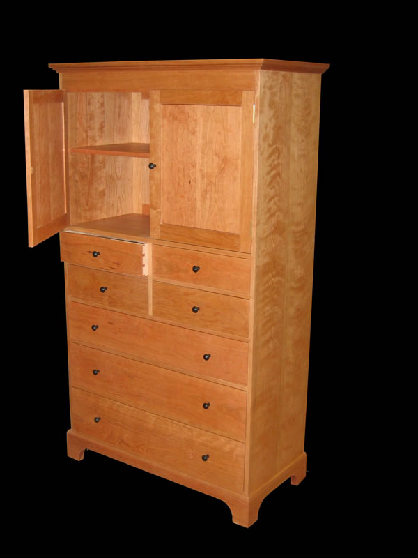 Cherry 7 drawer Shaker bureau with cabinet with flush drawer fronts, mitered base & ebonized knobs. 72" high x 42" wide x 20" deep