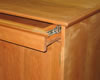 Optional hidden compartment above cabinet