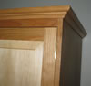 Door with maple wide raised panel detail