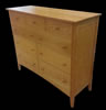 9 drawer Mission post & panel dresser in cherry with walnut accents