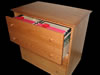 Drawers hold letter size folders in 2 rows running front to back or legal size folders in 1 row running side to side.
