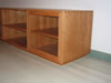 The dovetailed case sits on a 2" high recessed base