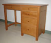 Cherry single pedestal desk - 42" x 20" x 30"h