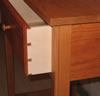 Dovetailed drawer, beaded leg corner, pinned mortise & tenon joints.