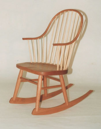 cherry continuous arm rocking chair