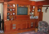 Custom cherry entertainment center with TV lift