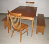60" x 36" x 30" high cherry table with spindle back chairs and Shaker arched benches
